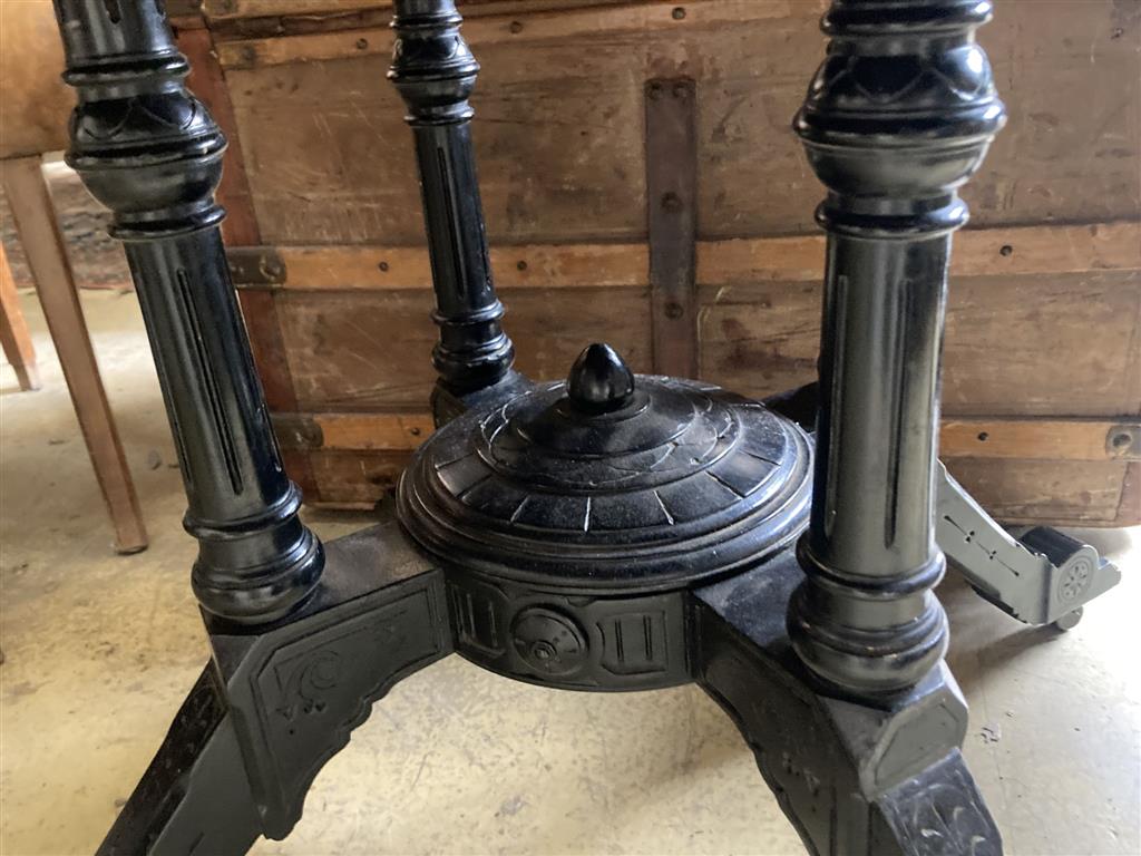 In the manner of Lamb of Manchester. An octagonal amboyna ebonised centre table, bear Southport stamp, width 98cm, depth 98cm, height 7